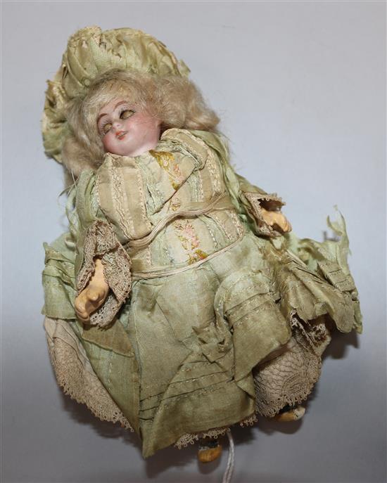 A Jumeau bisque head doll